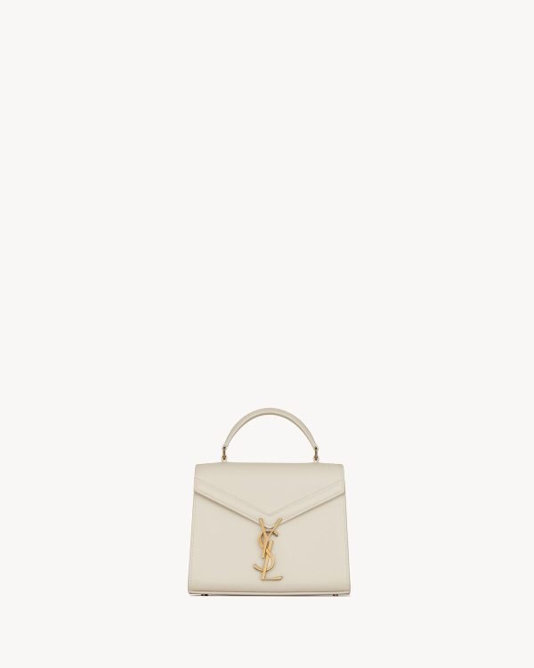 Cassandra Mini Top Handle Bag In Grain De Poudre Embossed Leather